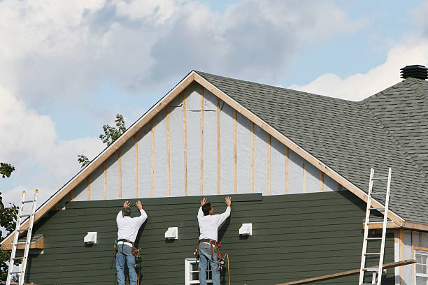 Professional Siding Installation technician working in Worthington, IN